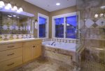 Master suite with soaking tub and walk-in shower